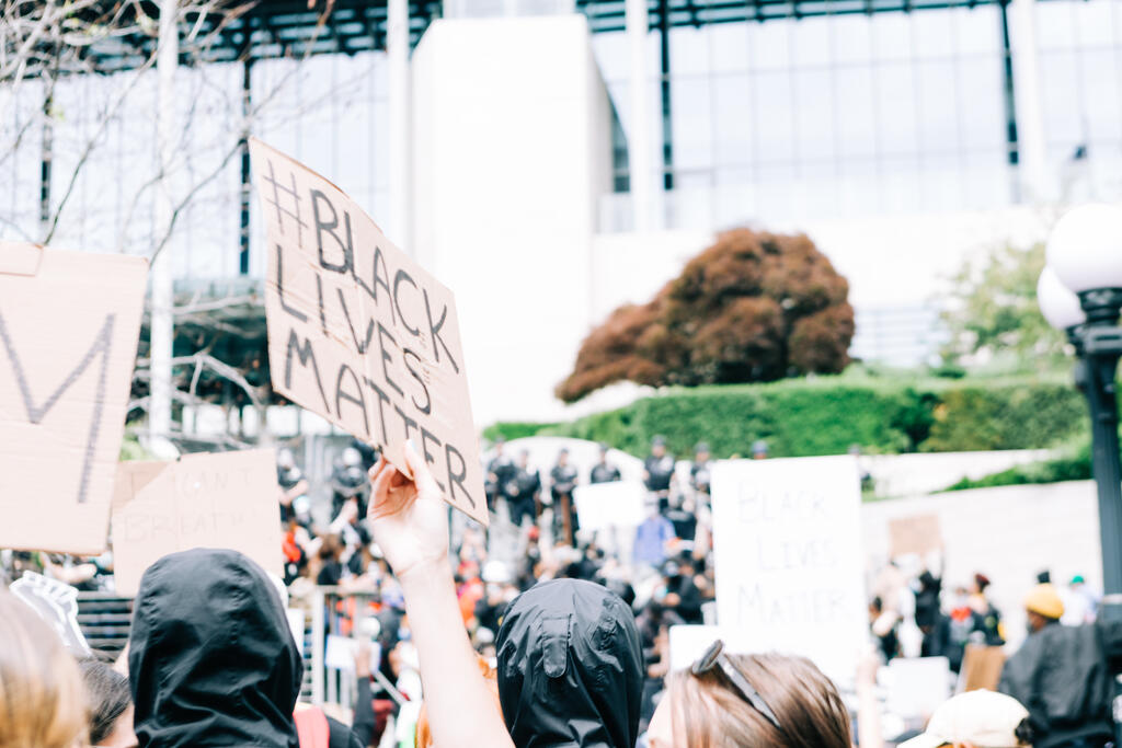 Peaceful Protesters Holding Black Lives Matter Signs large preview