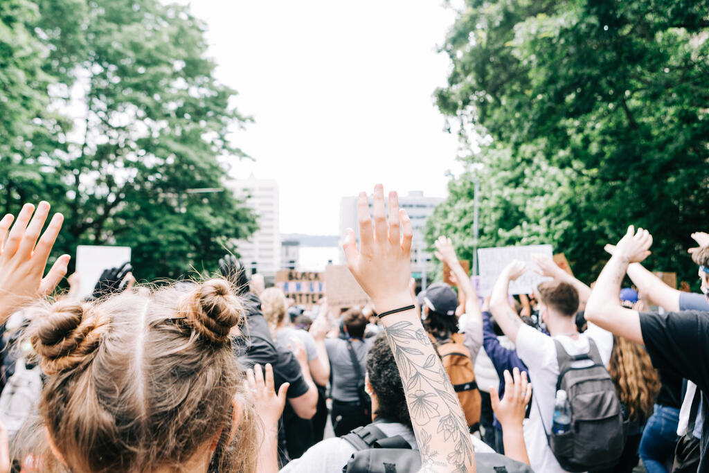 Peaceful Protesters with Their Hands Up large preview