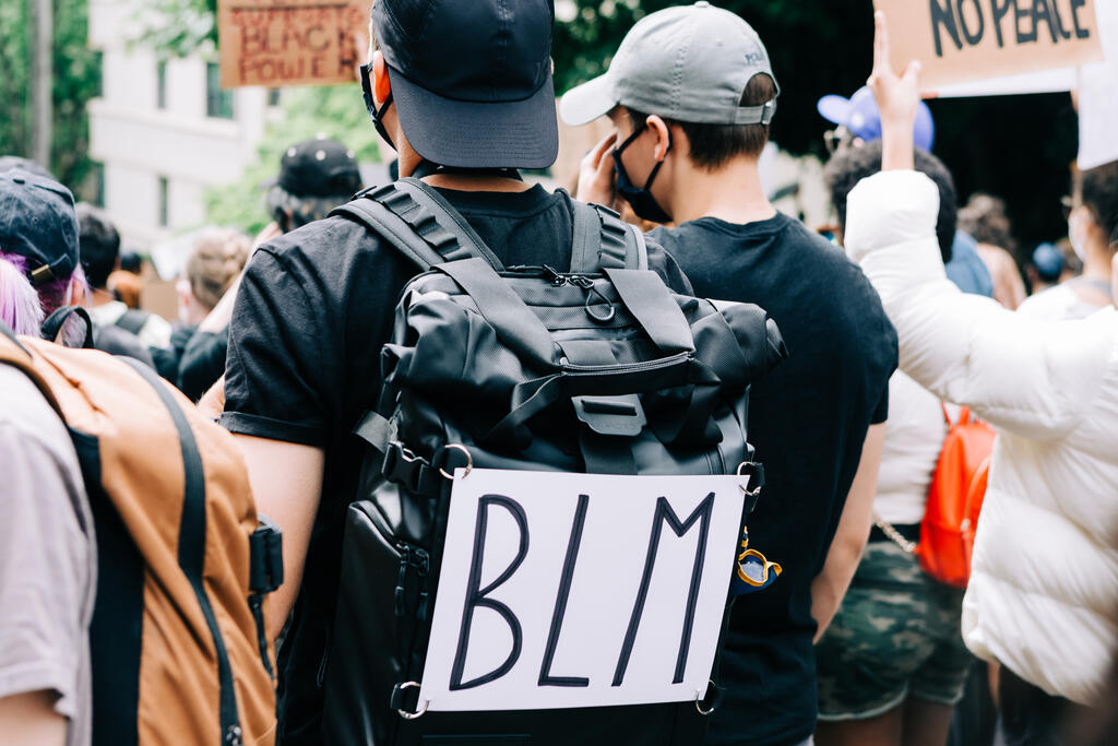 Peaceful Protester with a BLM Backpack large preview