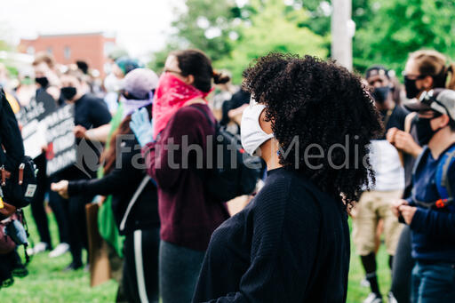 Black Woman at a Rally