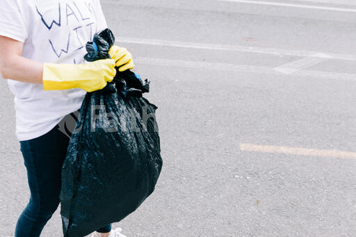 Volunteer Picking Up Trash After a Peaceful Protest