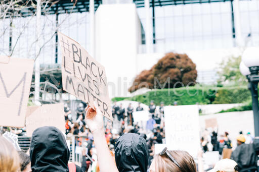 Peaceful Protesters Holding Black Lives Matter Signs