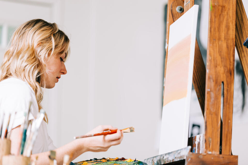 A Woman Painting a Canvas large preview