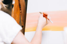 A Woman Painting a Canvas  image 1