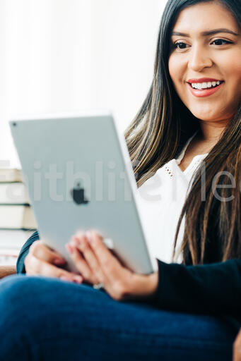 Woman Studying on an iPad