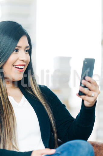 Woman Studying on an iPhone