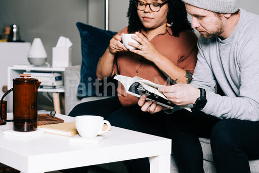 Couple Reading and Drinking Coffee