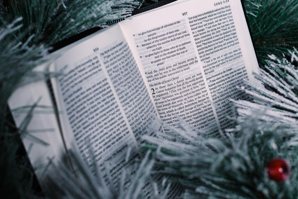 Bible Open to the Christmas Story with Greenery and Berries large preview