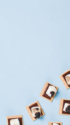 S'mores Scattered on Blue Background  image 17