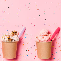 Cartons of Ice Cream with Spoons on Pink Background  image 3
