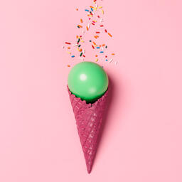 Pink Ice Cream Cone with a Green Balloon and Sprinkles  image 1