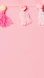 Yarn Tassel Garland on Pink Background  image 4