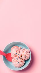 A Blue Bowl of Strawberry Ice Cream on Pink Background  image 3
