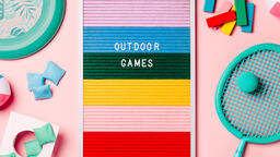 Outdoor Games Letter Board with Game Supplies on Pink Background  image 2