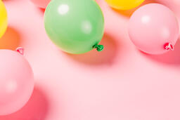 Citrus Colored Balloons Scattered on Pink Background  image 15