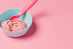 A Blue Bowl of Strawberry Ice Cream on Pink Background  image 4