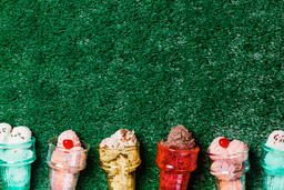 Ice Cream in Colorful Cone Dishes on Grass  image 2