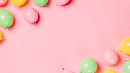 Citrus Colored Balloons Scattered on Pink Background  image 1