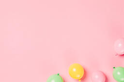 Citrus Colored Balloons Scattered on Pink Background  image 7