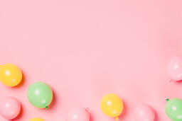 Citrus Colored Balloons Scattered on Pink Background  image 21