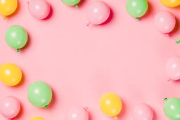 Citrus Colored Balloons Scattered on Pink Background  image 8