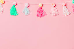 Yarn Tassel Garland on Pink Background  image 3
