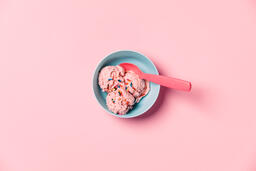 A Blue Bowl of Strawberry Ice Cream on Pink Background  image 1