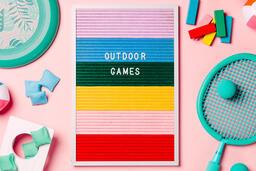 Outdoor Games Letter Board with Game Supplies on Pink Background  image 4