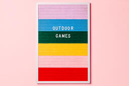 Outdoor Games Letter Board with Game Supplies on Pink Background  image 2