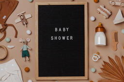 Welcome Baby Letter Board Surrounded by Baby Items  image 7