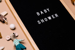 Baby Shower Letter Board Surrounded by Baby Items  image 5