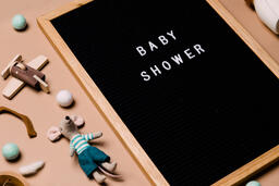 Baby Shower Letter Board Surrounded by Baby Items  image 3