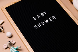 Baby Shower Letter Board Surrounded by Baby Items  image 4