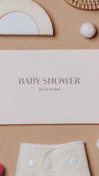 Pink Baby Shower Invitation Surrounded by Baby Items  image 12