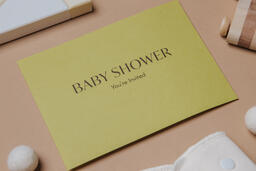 Yellow Baby Shower Invitation Surrounded by Baby Items  image 7