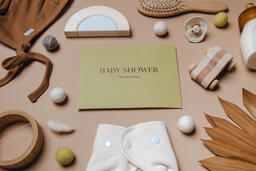 Yellow Baby Shower Invitation Surrounded by Baby Items  image 9