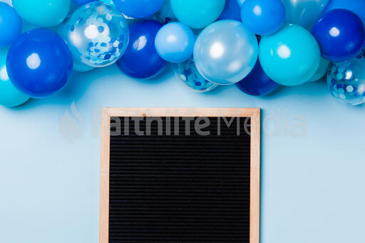 Letter Board with Blue Balloon Garland