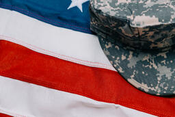 Military Hat on an American Flag  image 1