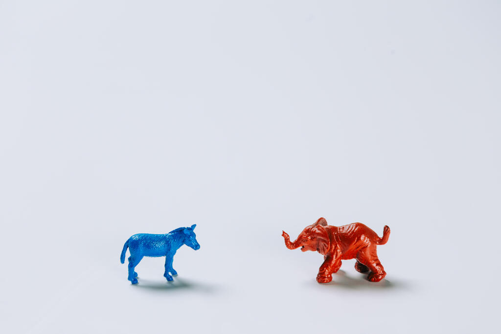 Blue Donkey and Red Elephant Facing Each Other large preview