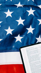 Open Bible on the American Flag  image 2