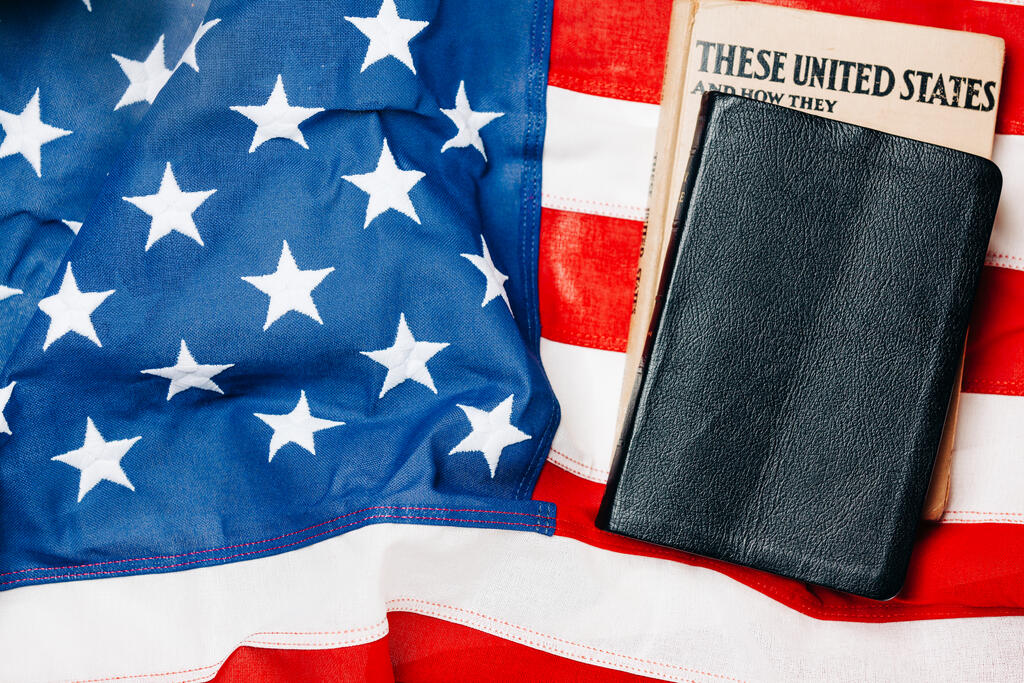 Bible and U.S. History Book on the American Flag large preview