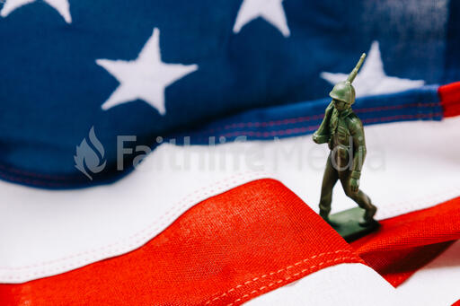 Toy Soldier Marching on an American Flag