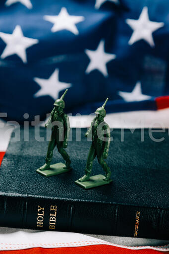 Toy Soldiers Marching on the Bible with an American Flag
