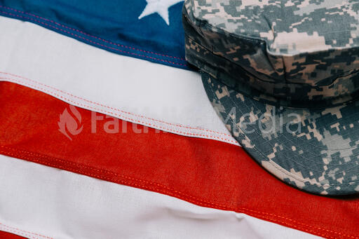 Military Hat on an American Flag