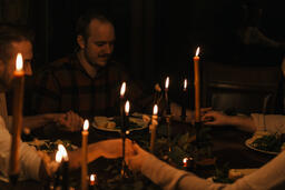 Small Group Praying Together Before a Meal  image 2