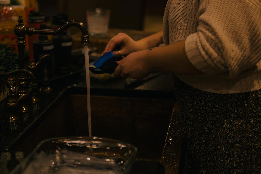 Woman Washing Dishes large preview