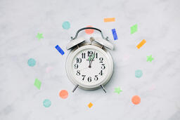 Clock Striking Midnight with Confetti  image 2