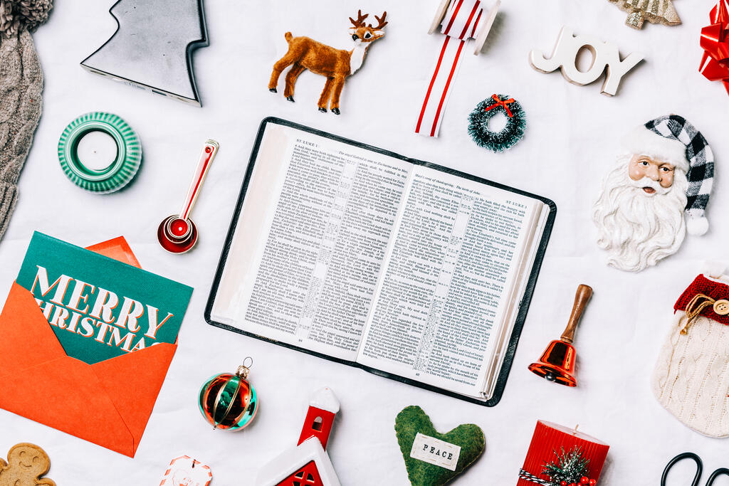 Open Bible with Commercial Christmas Items large preview