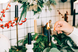 Woman Lighting a Candle  image 2