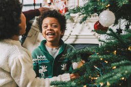 Kids Decorating the Christmas Tree Together  image 1